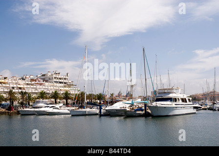 Boats moored in Vialmora harbour Portugal Stock Photo