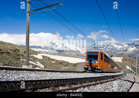 Gornergrat cogwheel Train in front of Matterhorn Stock Photo