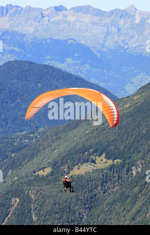 Paragliders launch from the Plan de l' Aiguille in Chamonix in the French Alps. Stock Photo