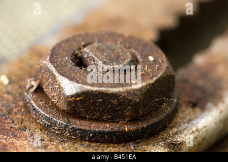 Close up photo of a rusty nut on an adjustable spanner. Stock Photo
