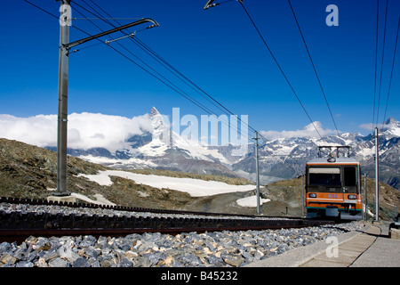 Gornergrat cogwheel Train in front of Matterhorn Stock Photo