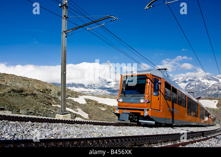 Gornergrat cogwheel Train in front of Matterhorn Stock Photo