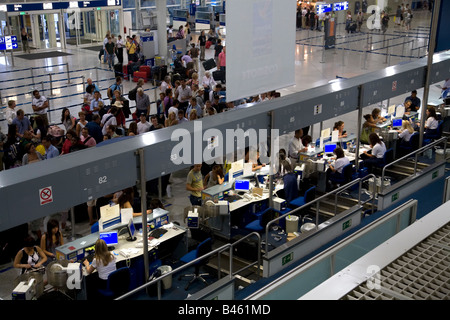 People Queuiing and Checking in at Athens Airport Greece Stock Photo