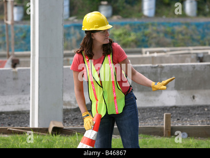 Woman working at a highway construction site in New York, USA Stock Photo