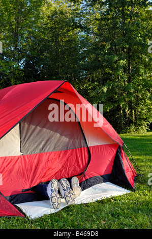 Young couple camping Stock Photo