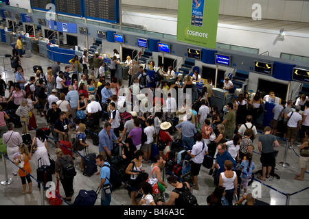 People Queuiing and Checking in at Athens Airport Greece Stock Photo