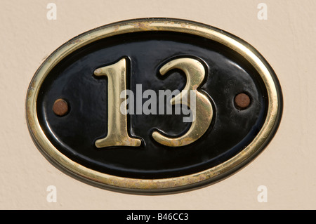 Number 13 house number plaque Stock Photo