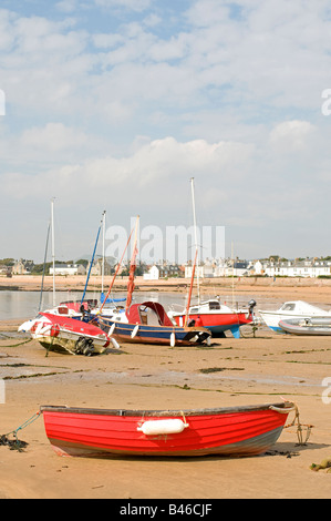 Leisure Craft resting at low tide on the sands at Elie Harbour Kingdom of Fife's East Neuk Stock Photo