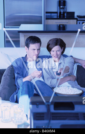 Couple Watching Television Stock Photo