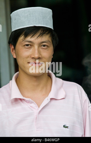 Young Man in the Muslim Quarter in Xian China Stock Photo