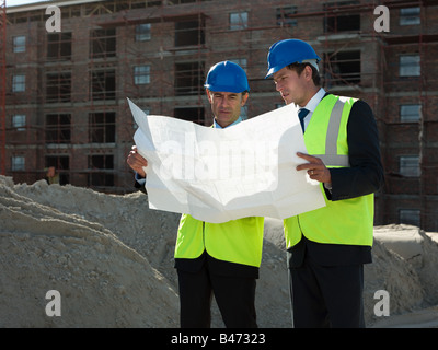 Architects on building site Stock Photo