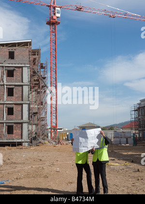 Architects on building site Stock Photo