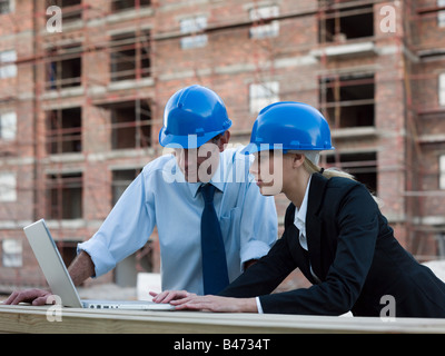 Engineers on building site Stock Photo