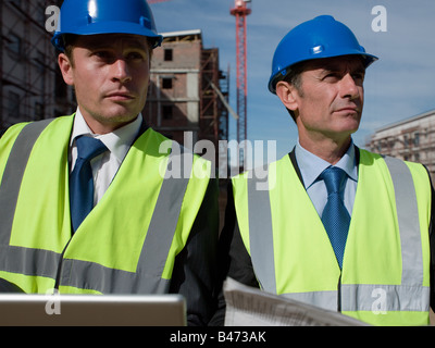 Engineers on building site Stock Photo