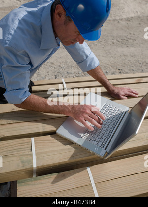 Engineer with laptop Stock Photo