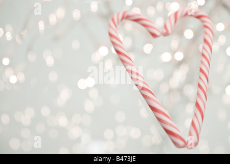 Candy canes in heart shape Stock Photo