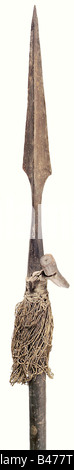 A German hunting spear, ca. 1500. Tapering blade of articulate diamond section on a ridged square, then octagonal socket with an iron ring with leather-bound staghorg peg and the original plaited tassel. The slightly bent ashwood(?) shaft decorated with rectangular knobs over the lower two thirds of its length and with an inventory label of the Dorgerloh Foundation. Length 223 cm. August Dorgerloh (1819 - 1901) was a well-known art collector from Gablauken in East Prussia. He bequeathed his collection to the Academy of Arts in Königsberg. historic, historical, , Stock Photo