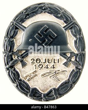 A Wound Badge 20 July, 1944 in Black., In original presentation case. Silver, with areas of patination. Reverse stamped 'L/12' for C.E. Juncker Berlin and '800'. 44.47 x 37.22 mm, weight 38.98 g (OEK 3849). Original black presentation case, the interior lined in black velvet and white silk, magnetic fittings. Of extreme rarity, only 23 were awarded in the three grades of gold, silver and black. Included is an expert opinion with photo by Detlev Niemann dated September 2005. historic, historical, 1930s, 20th century, awards, award, German Reich, Third Reich, Naz,