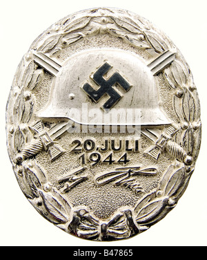 A Wound Badge '20 July 1944' in Silver., As new in the original presentation case. Massive silver, partially polished. Marked 'L/12' on the back for C.E. Juncker, Berlin along with the silver hallmark '800'. 44.43 x 37.22 mm. Weight 38.96 grams (OEK 3848). Original black presentation case, lined with black velvet and white silk, magnetic fittings, the catch is missing. Extremely rare, an original has never before been offered for sale. There have only been 23 awards at all three levels, gold, silver, and black. It is certain that two of these were awarded at th,
