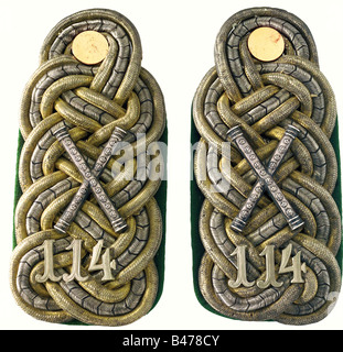 Baden: Crown Prince Friedrich of Prussia (later to become Emperor Friedrich III) - a pair of shoulder boards, worn in his capacity as regimental proprietor of the 6th Baden Infantry Regiment No. 114, holding the rank of field marshal. As worn from 1877 to 1888. Green background, with the regimental number '114' in silver, and crossed field marshal's batons. historic, historical, 19th century, uniform, uniforms, object, objects, stills, clipping, clippings, cut out, cut-out, cut-outs, Stock Photo