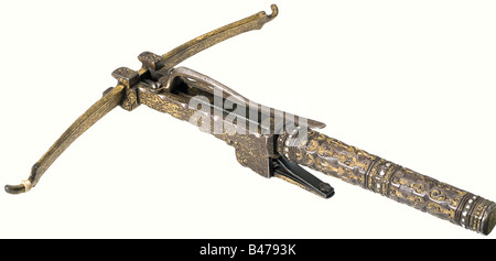 A rare all-metal magnificent crossbow, German (Nuremberg?), circa 1580. Gold plated prod with etched decoration of leaping hares and hounds amid leafy vines. Two-piece iron tiller. The front part has fine gold inlaid arabesque decoration. The rear half is octagonal with chiselled and gilded ornamentation and inlayed dots of silver. The end plate bears an engraved coat of arms. There is a lightly engraved belt hook on the under side. Extremely rare self-cocking mechanism. The quarrel channel and the lock are set on a threaded bar, and move back and forth as the , Stock Photo