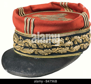 Philippe Pétain - Képi as Général de Division (Major General)., A black band with two rows of high oak leaf embroidery. Red top with distinctive gold braid and golden cord à la Milanaise. Black leather visor with the initials 'P.P.' stamped in gold on the inside. Red silk interior lining with the manufacturer's inscription 'Girard'. Inside circumference 55.5 cm. Good condition, only the sweatband and interior lining show clear marks of wear. It comes with a photograph from the First World War showing Pétain wearing the képi. There is also a copy of a letter fro, Stock Photo
