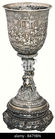 Count Friedrich-Werner von der Schulenburg - a silver goblet, once the possession of Tsar Nicholas II and his wife Alexandra Fiodorovna. The goblet is embossed, chiseled, and engraved. Chinese export marks for approx. 1900. Surface completely ornamented with illustrations of battle scenes and court life. There is a shield-shaped field on the obverse side bearing the crowned monograms of the ruling pair 'N II' and 'A'. The stem is in the shape of an ascending, twisting lucky dragon. The openwork, carved base is of high quality wood. Height 35 cm. Weight with bas, Stock Photo