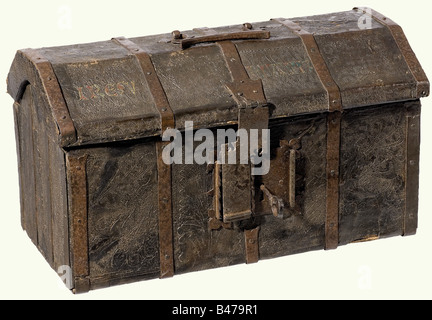 A late Gothic travelling chest, France, circa 1500. A small rectangular chest with an arched lid of leather covered wood with iron strap fittings. The lid has a folding handle, a frontal lock with hasp, key included. The leather cover has finely tooled Gothic ornamentation. The front of the lid bears the lightly coloured inscription "IRESU" and "MARIA". The interior linen lining has been renewed. Dimensions 29 x 50 x 28 cm. historic, historical, 16th century, handicrafts, handcraft, craft, object, objects, stills, clipping, clippings, cut out, cut-out, cut-outs, Stock Photo
