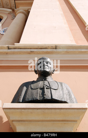 Pope John Paul II bust in front of Church of Our Lady Queen of Poland in Warsaw (Field-Cathedral of the Polish Army) Stock Photo