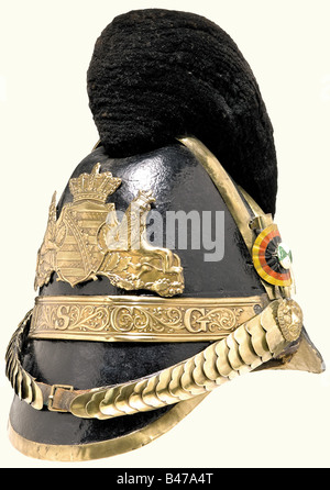 A helmet for enlisted men, of the Saxe-Coburg-Gotha Infantry Regiment, 1849 A leather helmet with black wool crest, brass mountings, and a brass band on the front with the letters 'EHSCG' (Ernst, Herzog von Sachsen-Coburg-Gotha). Cambered metal chinscales on lion's head rosettes. Green-white national cockade on the left on the black-red-gold Bund cockade. Conical socket for the ceremonial plume. Replacement fabric lining with a collection label 'U5857'. Various traces of old restorations. The infantry battalion participated in the battle at Eckernförde (5 April, Stock Photo
