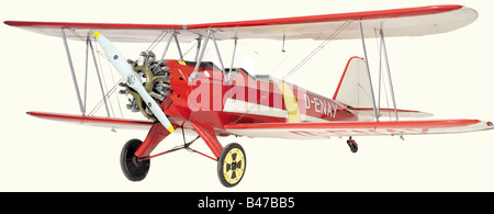 A fine flying scale model, of Focke-Wulf Fw.44 "Stieglitz"-D-ENAY, "Quax" Fully braced upper and lower mainplanes, flying control surfaces, excellent cockpit detail for pilot and pupil/passenger, the dummy seven-cylinder Siemens radial engine concealing a two-stroke petrol engine, with dummy propeller, the sprung main undercarriage with rubber tyres and steerable tail wheel, finished in red, yellow and white "barnstorming sunburst" display livery, (234 cm wing span). historic, historical, 1910s, 20th century, First World War / WWI, world war, world wars, milita, Stock Photo