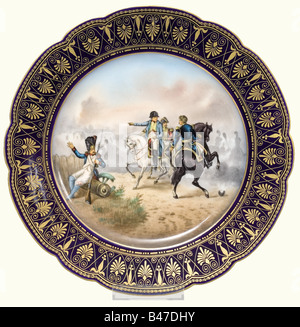 Napoleon I - nine Sèvres plates, between 1804 and 1814. Each plate adorned in the centre with an extremely elaborate painting of one of Bonaparte's famous battles, on the border a stencilled pattern in gold on the famous 'bleu des Sèvres'. On the back the name of the battle and a stencilled red manufacturer's mark. Diameter each 24 cm. Each plate shows a scene from the following events and is accordingly marked on the back: 'Toulon' (1793), 'Pont S'Arcole' (1798), 'Zurich' (1799), 'Passage de la Linz' (1800), 'Austerlitz' (1805), 'Eylau' (1807), 'Wagram' (1809), Stock Photo