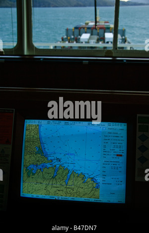 Electronc chart display on the bridge of a container ship entering Lyttelton Harbour, New Zealand. Stock Photo