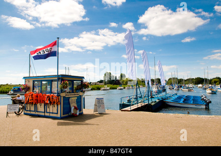 Boat hire kiosk on Christchurch Quay besides the River Stour, Dorset, England, UK Stock Photo