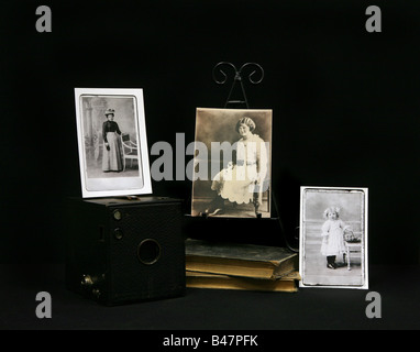 Vintage Photographs from 1910 era With Books and Vintage Pinhole Camera Stock Photo