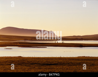 dh Standing Stones of Stenness STENNESS ORKNEY Loch of Harray and Stenness Hoy Hills sunset neolithic scotland bronze age Stock Photo