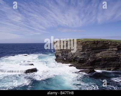 dh Brough of Bigging YESNABY ORKNEY Scotland Sea waves rough seas blue sky cliffs coast cloud windy skies clouds