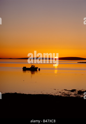 dh St Marys Bay HOLM ORKNEY Sunset over Scapa Flow fishing creel boat tranquil scotland island sun setting sea uk