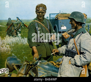 Wehrmacht Cigarette Break German motorcycle messengers on the Eastern Front in the Russian campaign in WW II Stock Photo