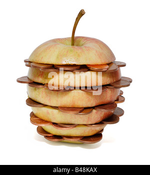 An apple with coins inside Stock Photo