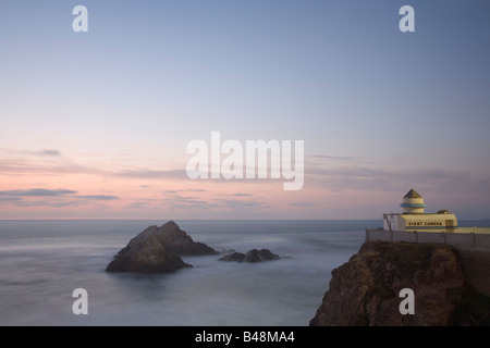 The Camera Obscura sits above the Pacific Ocean behind the Cliff House in San Francisco California USA Stock Photo