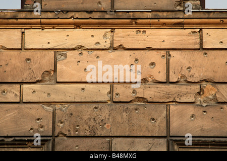 Bullet holes from World War II on a wall in the centre of Berlin Stock Photo