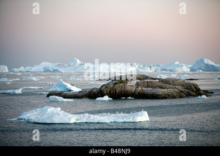 Aug 2008 - Floating icebergs from the Ilulissat Kangerlua Glacier also known as Sermeq Kujalleq at Disko Bay Greenland Stock Photo