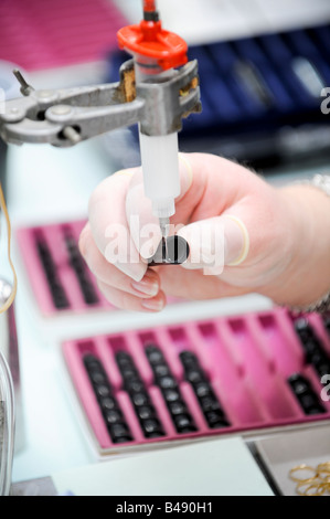 Parker Pen factory in Newhaven, Sussex, UK. The assembly line of the famous pen brand as it celebrated 120 years in 2008. Stock Photo