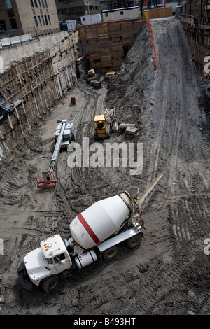 A cement mixer at a building construction site. Stock Photo