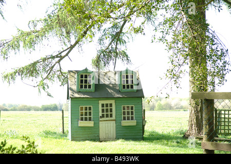 A lovely Childs Wendy house set in the Gardens of a Private House Stock Photo