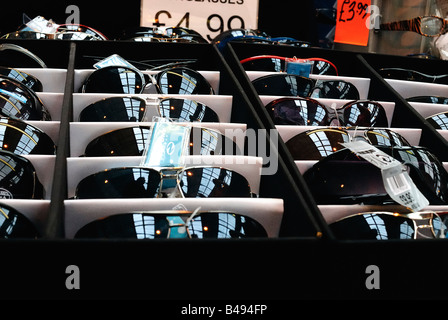 A market stall selling cheap sunglasses. Stock Photo