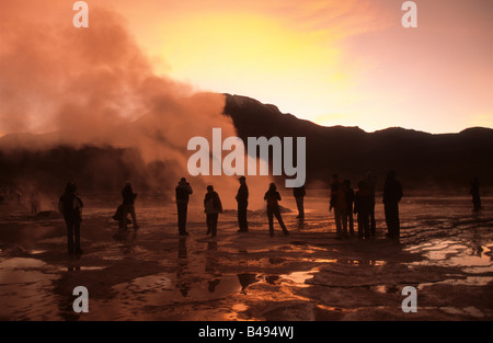 Tourists visiting the El Tatio geyser field at sunrise, near San Pedro de Atacama, Chile Stock Photo