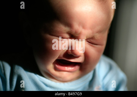 5 month old baby girl crying Stock Photo