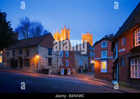 Steep Hill Lincoln looking up towards the Cathedral Lincolnshire England at twilight Stock Photo